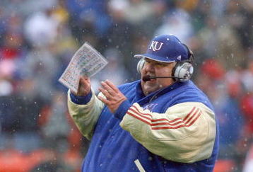 KANSAS CITY, MO - NOVEMBER 29:  Head coach Mark Mangino of the Kansas Jayhawks watches the action during the game against the Missouri Tigers on November 29, 2008 at Arrowhead Stadium in Kansas City, Missouri. (Photo by Jamie Squire/Getty Images)