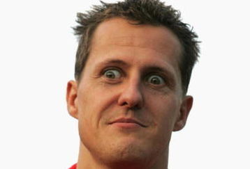 SUZUKA, JAPAN - OCTOBER 7: Michael Schumacher of Germany and Ferrari relaxes in the paddock prior to the Formula One Japanese Grand Prix at Suzuka Circuit on October 7, 2004 in Tokyo, Japan.  (Photo by Mark Thompson/Getty Images)