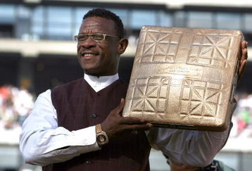 OAKLAND, CA - AUGUST 01:  Hall of Fame baseball player Rickey Henderson holds up a golden base during a ceremony to retire his number 24 by the Oakland Athletics before the start of the game against the Toronto Blue Jays August 1, 2009 at the McAfee Coliseum in Oakland, California. Henderson was inducted into the Baseball Hall of Fame July 26.  (Photo by Justin Sullivan/Getty Images)