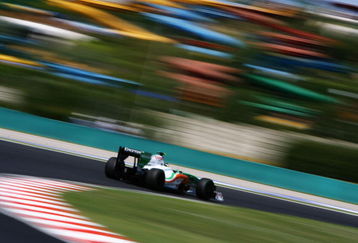 BUDAPEST, HUNGARY - JULY 24:  Giancarlo Fisichella of Italy and Force India drives during practice for the Hungarian Formula One Grand Prix at the Hungaroring on July 24, 2009 in Budapest, Hungary.  (Photo by Paul Gilham/Getty Images)