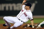 BOSTON - JULY 28:  Rajai Davis #11 of the Oakland Athletics steals second base in the 11th inning as Nick Green #22 of the Boston Red Sox fails to make the tag at Fenway Park July 28, 2009 in Boston, Massachusetts. The A's defeated the Boston Red Sox 9-8 in 11 innings. (Photo by Elsa/Getty Images)