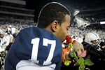 STATE COLLEGE, PA - NOVEMBER 22:  Darryl Clark #17 of the Penn State Nittany Lions smells a rose after clinching the Big Ten title and clinching a bid to the Rose Bowl after the game against the Michigan State Spartans on November 22, 2008 at Beaver Stadium in State College, Pennsylvania. Penn State won the game 49-18. (Photo by Joe Sargent/Getty Images)