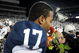STATE COLLEGE, PA - NOVEMBER 22: Darryl Clark #17 of the Penn State Nittany Lions smells a rose after clinching the Big Ten title and clinching a bid to the Rose Bowl after the game against the Michigan State Spartans on November 22, 2008 at Beaver Stadium in State College, Pennsylvania. Penn State won the game 49-18. (Photo by Joe Sargent/Getty Images)