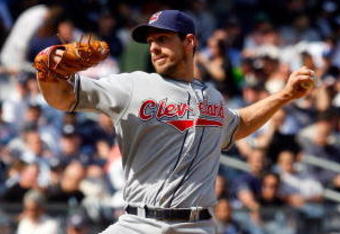 NEW YORK - APRIL 16:  Cliff Lee #31 of the Cleveland Indians pitches against the New York Yankees during opening day at the new Yankee Stadium on April 16, 2009 in the Bronx borough of New York City. This is the first regular season MLB game being played at the new venue which replaced the old Yankee Stadium as the Yankees home field.  (Photo by Jim McIsaac/Getty Images)