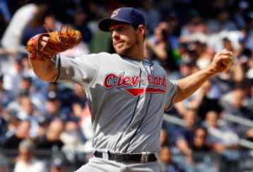 NEW YORK - APRIL 16:  Cliff Lee #31 of the Cleveland Indians pitches against the New York Yankees during opening day at the new Yankee Stadium on April 16, 2009 in the Bronx borough of New York City. This is the first regular season MLB game being played at the new venue which replaced the old Yankee Stadium as the Yankees home field.  (Photo by Jim McIsaac/Getty Images)