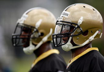 METAIRIE, LA - MAY 08:  Malcom Jenkins #27 left and Chip Vaugh #37 of the New Orleans Saints works out during the Rookie Minicamp at the New Orleans Saints Training Facility on May 8, 2009 in Metairie, Louisiana.  (Photo by Chris Graythen/Getty Images)