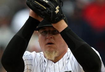 CHICAGO - APRIL 29: Bobby Jenks #45 of the Chicago White Sox winds up for a pitch in the ninth inning against the Seattle Mariners on April 29, 2009 at U.S. Cellular Field in Chicago, Illinois. The White Sox defeated the Mariners 6-3. (Photo by Jonathan Daniel/Getty Images)