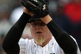 CHICAGO - APRIL 29: Bobby Jenks #45 of the Chicago White Sox winds up for a pitch in the ninth inning against the Seattle Mariners on April 29, 2009 at U.S. Cellular Field in Chicago, Illinois. The White Sox defeated the Mariners 6-3. (Photo by Jonathan Daniel/Getty Images)