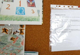 ATHENS, GREECE - AUGUST 9: A cartoon depicting bottles of chemicals winning Olympic medals (L) is pinned to a noticeboard at the Doping Control Laboratory of Athens during the final days before the start of the 2004 Olympic Games August 9, 2004 in Athens. The Olympic Games will start on Friday, August 13. (Photo by Ian Waldie/Getty Images)    *** Local Caption ***