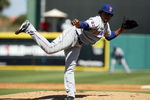 JUPITER, FL - MARCH 3:  Starting pitcher Edinson Volquez #36 of the Dominican Republic pitches against the Florida Marlins during an exhibition game at Roger Dean Stadium March 3, 2009 in Jupiter, Florida.  (Photo by Doug Benc/Getty Images)