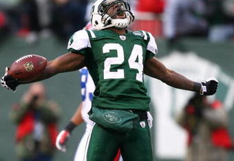 EAST RUTHERFORD, NJ - DECEMBER 14:  Darrelle Revis #24 of the New York Jets celebrates making a game saving interception in the closing minutes of regulation preserving a 31-27 win against the Buffalo Bills during their game on December 14, 2008 at Giants Stadium in East Rutherford, New Jersey.  (Photo by Al Bello/Getty Images)