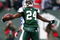 EAST RUTHERFORD, NJ - DECEMBER 14:  Darrelle Revis #24 of the New York Jets celebrates making a game saving interception in the closing minutes of regulation preserving a 31-27 win against the Buffalo Bills during their game on December 14, 2008 at Giants Stadium in East Rutherford, New Jersey.  (Photo by Al Bello/Getty Images)
