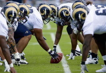 ST. LOUIS - JULY 31:  The St. Louis Rams offense lines up across each other during training camp at the Russell Athletic Training Facility on July 31, 2009 in St. Louis, Missouri.  (Photo by Dilip Vishwanat/Getty Images)