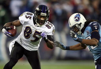NASHVILLE, TN - JANUARY 10:  Wide receiver Derrick Mason #85 of the Baltimore Ravens looks to run by safety Michael Griffin #33 of the Tennessee Titans during the AFC Divisional Playoff Game on January 10, 2009 at LP Field in Nashville, Tennessee.  (Photo by Andy Lyons/Getty Images)