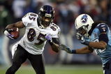 NASHVILLE, TN - JANUARY 10:  Wide receiver Derrick Mason #85 of the Baltimore Ravens looks to run by safety Michael Griffin #33 of the Tennessee Titans during the AFC Divisional Playoff Game on January 10, 2009 at LP Field in Nashville, Tennessee.  (Photo by Andy Lyons/Getty Images)