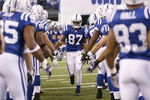 INDIANAPOLIS - DECEMBER 28:  Reggie Wayne #99 of the Indianapolis Colts greets teammates as he is introduced before the game against the Tennessee Titans on December 28, 2008 at Lucas Oil Stadium in Indianapolis, Indiana. (Photo by: Jamie Squire/Getty Images)