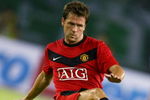 HANGZHOU, CHINA - JULY 26:  Michael Owen of Manchester United in action during a pre-season friendly match between Hangzhou Greentown and Manchester United as part of the club's Asia Tour 2009 at Huang Long Stadium on July 26, 2009 in Hangzhou, China.  (Photo by Feng Li/Getty Images)