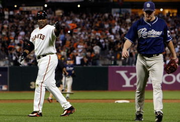 SAN FRANCISCO - SEPTEMBER 26:  Barry Bonds #25 of the San Francisco Giants points to Jake Peavy #44 of the San Diego Padres as leaves the game at the end of the sixth inning September 26, 2007 at AT&T Park in San Francisco, California. Tonight will be the final home game for Bonds as a member of the San Francisco Giants.  (Photo by Justin Sullivan/Getty Images)