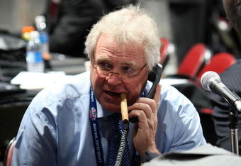 MONTREAL, QC - JUNE 27:  General Manager and President Glen Sather of the New York Rangers works the phones during the 2009 NHL Entry Draft at the Bell Centre on June 27, 2009 in Montreal, Quebec, Canada.  (Photo by Bruce Bennett/Getty Images)