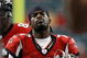 ATLANTA - DECEMBER 24:   Quarterback Michael Vick #7 of the Atlanta Falcons walks off against the Carolina Panthers December 24, 2006 at The Georgia Dome  in Atlanta,Georgia  (Photo by Marc Serota/Getty Images)