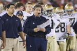 LOS ANGELES - NOVEMBER 29:  Head coach Charlie Weis of the Notre Dame Fighting Irish looks on from the sideline against the USC Trojans on November 29, 2008 at the Los Angeles Memorial Coliseum in Los Angeles, California.  USC won 38-3.  (Photo by Jeff Golden/Getty Images)