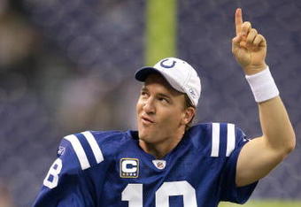 INDIANAPOLIS - DECEMBER 07:  Peyton Manning #18 of the Indianapolis Colts celebrates as he runs off the field after their 35-3 win against the Cincinnati Bengals at Lucas Oil Stadium on December 7, 2008 in Indianapolis, Indiana.  (Photo by Andy Lyons/Getty Images)