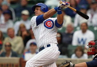 CHICAGO - JULY 8:  Aramis Ramirez #16 of the Chicago Cubs bats against the Atlanta Braves during the game on July 8, 2009 at Wrigley Field in Chicago, Illinois. (Photo by Jonathan Daniel/Getty Images) 