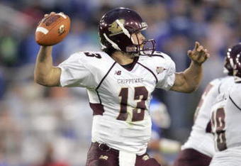 LEXINGTON, KY - SEPTEMBER 30: Dan LeFevour #13 of the Central Michigan Chippewas passes the ball during the game against the Kentucky Wildcats on September 30, 2006 at Commonwealth Stadium in Lexington, Kentucky. (Photo by Andy Lyons/Getty Images)