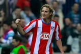 MADRID, SPAIN - MARCH 01: Diego Forlan of Atletico Madrid  celebrates after scoring his team's fourth goal during the La Liga match between Atletico Madrid and Barcelona at the Vicente Calderon stadium on March 1, 2008 in Madrid, Spain.  (Photo by Denis Doyle/Getty Images)
