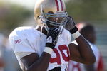 SANTA CLARA, CA - AUGUST 04:  Manny Lawson #99 looks on during the 49ers training camp at their practice facilities on August 4, 2009 in Santa Clara, California.  (Photo by Jed Jacobsohn/Getty Images)