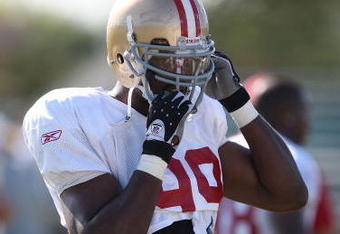 SANTA CLARA, CA - AUGUST 04:  Manny Lawson #99 looks on during the 49ers training camp at their practice facilities on August 4, 2009 in Santa Clara, California.  (Photo by Jed Jacobsohn/Getty Images)