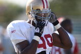 SANTA CLARA, CA - AUGUST 04:  Manny Lawson #99 looks on during the 49ers training camp at their practice facilities on August 4, 2009 in Santa Clara, California.  (Photo by Jed Jacobsohn/Getty Images)