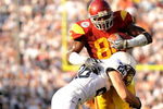PASADENA, CA - JANUARY 01:  Anthony McCoy #86 of the USC Trojans runs for yardage against Drew Astorino #28 of the Penn State Nittany Lions during the 95th Rose Bowl Game presented by Citi on January 1, 2009 at the Rose Bowl in Pasadena, California.  (Photo by Harry How/Getty Images)