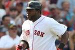 BOSTON - JULY 30:  Designated hitter David Ortiz #34 of the Boston Red Sox jogs to home plate after hitting a three-run home run against the Oakland A's in the seventh inning to give the Red Sox a 6-5 lead on July 30, 2009 at Fenway Park in Boston, Massachusetts.  (Photo by Elsa/Getty Images)
