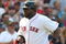 BOSTON - JULY 30:  Designated hitter David Ortiz #34 of the Boston Red Sox jogs to home plate after hitting a three-run home run against the Oakland A's in the seventh inning to give the Red Sox a 6-5 lead on July 30, 2009 at Fenway Park in Boston, Massachusetts.  (Photo by Elsa/Getty Images)