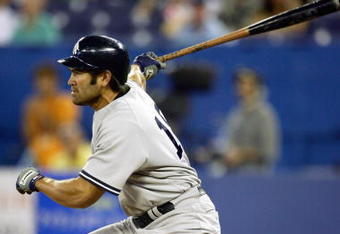 TORONTO - JULY 23:  Johnny Damon #18 of the New York Yankees bats against the Toronto Blue Jays at Rogers Centre on July 23, 2006 in Toronto, Ontario, Canada. The Blue Jays defeated the Yankees 13-5.   (Photo by Harry How/Getty Images)