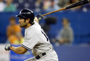 TORONTO - JULY 23:  Johnny Damon #18 of the New York Yankees bats against the Toronto Blue Jays at Rogers Centre on July 23, 2006 in Toronto, Ontario, Canada. The Blue Jays defeated the Yankees 13-5.   (Photo by Harry How/Getty Images)
