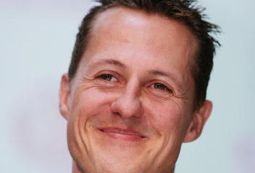 ROSBACH, GERMANY - JANUARY 20:  Formula One driver Michael Schumacher smiles during his visit of the mineral water plant of Rosbacher Brunnen on January 20, 2005 in Rosbach near Frankfurt, Germany. Schumacher was introduced as endorsement partner of Rosbacher who will appear in ads for their mineral water (Photo by Ralph Orlowski/Getty Images)