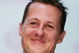 ROSBACH, GERMANY - JANUARY 20: Formula One driver Michael Schumacher smiles during his visit of the mineral water plant of Rosbacher Brunnen on January 20, 2005 in Rosbach near Frankfurt, Germany. Schumacher was introduced as endorsement partner of Rosbacher who will appear in ads for their mineral water (Photo by Ralph Orlowski/Getty Images)