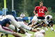 FOXBORO, MA - JULY 31: Tom Brady #12 of the New England Patriots stretches during training camp on July 31, 2009 at Gillette Stadium in Foxboro, Massachusetts. (Photo by Elsa/Getty Images)