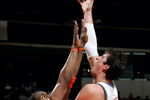 CHARLOTTE, NC - MARCH 23:  Primoz Brezec #7 of the Charlotte Bobcats shoots over Amare Stoudemire #32 of the Phoenix Sun on March 23, 2005 at the Charlotte Coliseum in Charlotte, North Carolina. The Suns defeated the Bobcats 120-105.  NOTE TO USER: User expressly acknowledges and agrees that, by downloading and/or using this Photograph, user is consenting to the terms and conditions of the Getty Images License Agreement. (Photo by Streeter Lecka/Getty Images)