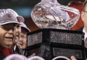 KANSAS CITY, MO - DECEMBER 06:  The Oklahoma Sooners recieve the trophy as they celebrate winning the Big 12 Championship game against the Missouri Tigers on December 6, 2008 at Arrowhead Stadium in Kansas City, Missouri. (Photo by Jamie Squire/Getty Images)