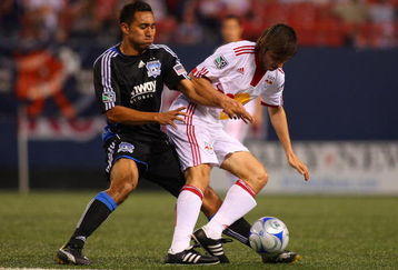 EAST RUTHERFORD, NJ - MAY 08:  Albert Celades #5  of the New York Red Bulls battles for the ball against Arturo Alvarez #10 of the San Jose Earthquakes at Giants Stadium in the Meadowlands on May 8, 2009 in East Rutherford, New Jersey.  (Photo by Mike Stobe/Getty Images for New York Red Bull)