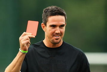 NOTTINGHAM, ENGLAND - JUNE 09:  Kevin Pietersen of England produces a red card during a game of football at Gresham Sports Park on June 9, 2009 in Nottingham, England.  (Photo by Matthew Lewis/Getty Images)