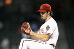 PHOENIX - APRIL 22:  Starting pitcher Dan Haren #15 of the Arizona Diamondbacks pitches against the Colorado Rockies during the game at Chase Field on April 22, 2009 in Phoenix, Arizona. The Diamondbacks defeated the Rockies 2-0.  (Photo by Christian Petersen/Getty Images)