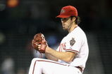 PHOENIX - APRIL 22:  Starting pitcher Dan Haren #15 of the Arizona Diamondbacks pitches against the Colorado Rockies during the game at Chase Field on April 22, 2009 in Phoenix, Arizona. The Diamondbacks defeated the Rockies 2-0.  (Photo by Christian Petersen/Getty Images)