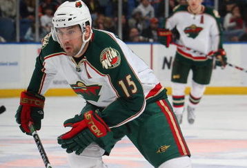 UNIONDALE, NY - MARCH 25: Andrew Brunette #15 of the Minnesota Wild skates against the New York Islanders on March 25, 2009 at the Nassau Coliseum in Uniondale, New York. (Photo by Bruce Bennett/Getty Images)