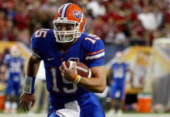 ATLANTA - DECEMBER 06:  Quarterback Tim Tebow #15 of the Florida Gators runs against the Alabama Crimson Tide during the SEC Championship on December 6, 2008 at the Georgia Dome in Atlanta, Georgia. The Gators defeated the Crimson Tide 31-20.  (Photo by Chris Graythen/Getty Images)