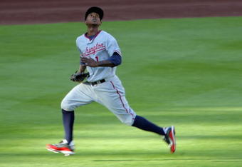 DENVER - JULY 06:  Center fielder Nyjer Morgan #1 of the Washington Nationals tracks down a fly ball against the Colorado Rockies during MLB action at Coors Field on July 6, 2009 in Denver, Colorado. The Rockies defeated the Nationals 1-0.  (Photo by Doug Pensinger/Getty Images)