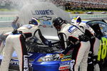 LONG POND, PA - AUGUST 03:  The #48 crew changes a carburetor on the Lowes Chevrolet, driven by Jimmie Johnson, during the NASCAR Sprint Cup Series Sunoco Red Cross Pennsylvania 500 at the Pocono Raceway on August 3, 2009 in Long Pond, Pennsylvania.  (Photo by Rusty Jarrett/Getty Images for NASCAR)